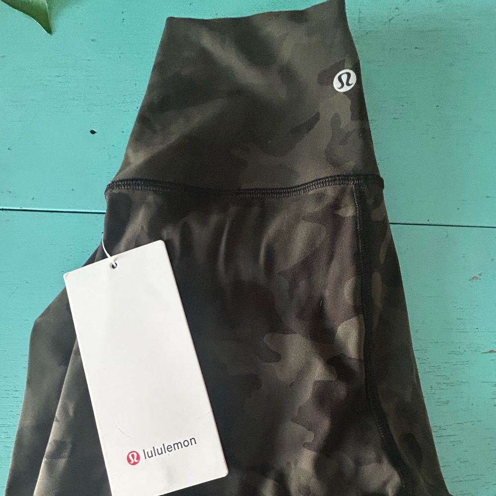 Never worn, camo Lululemon workout leggings. Tag still on them.